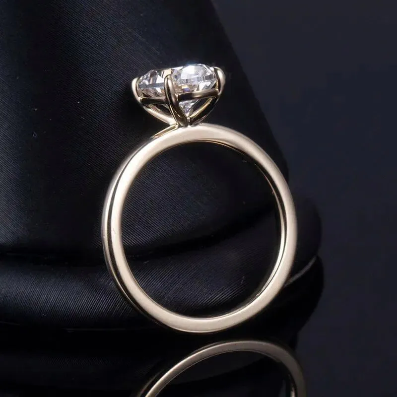 Side profile of The Elvika oval engagement ring showing its centre-stone setting