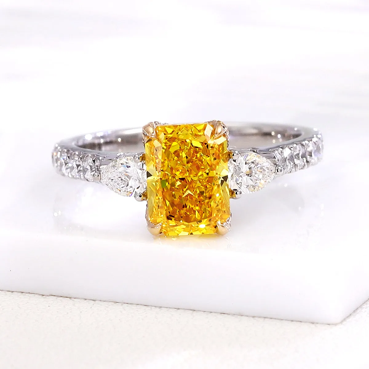 Radiant engagement rings