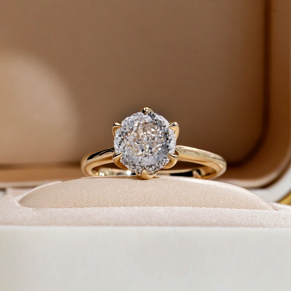 Forlovelsesring med marquise-slebne 2 karat