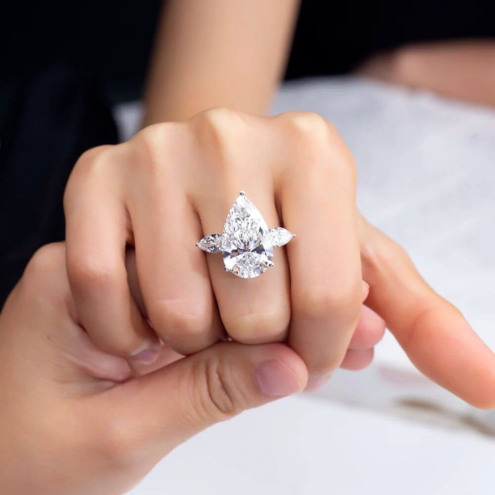 Buy The Aeralis 9CT Pear-Cut Lab Diamond Engagement Ring with Side Pears for only €6,250.00 at Chantal Vaulet!