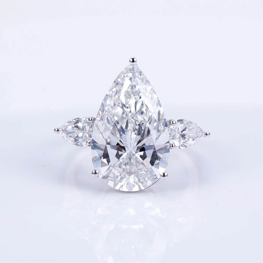Buy The Aeralis 9CT Pear-Cut Lab Diamond Engagement Ring with Side Pears for only €6,250.00 at Chantal Vaulet!