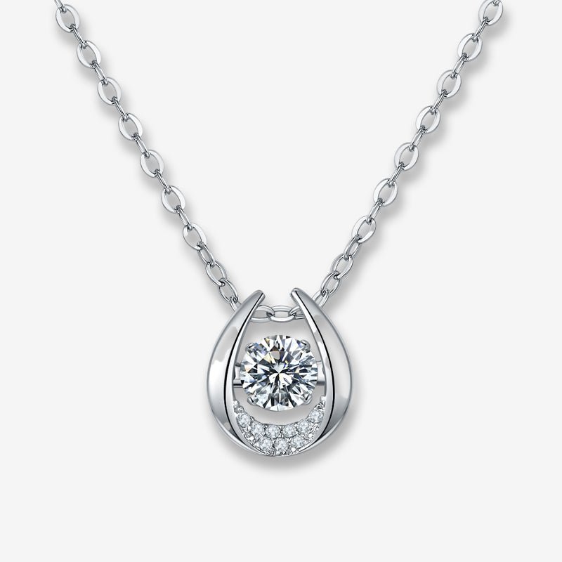 Shop The Auralyn Moissanite Dancing Teardrop Necklace today at Chantal Vaulet. Discover stunning jewelry collections, crafted for style and brilliance.