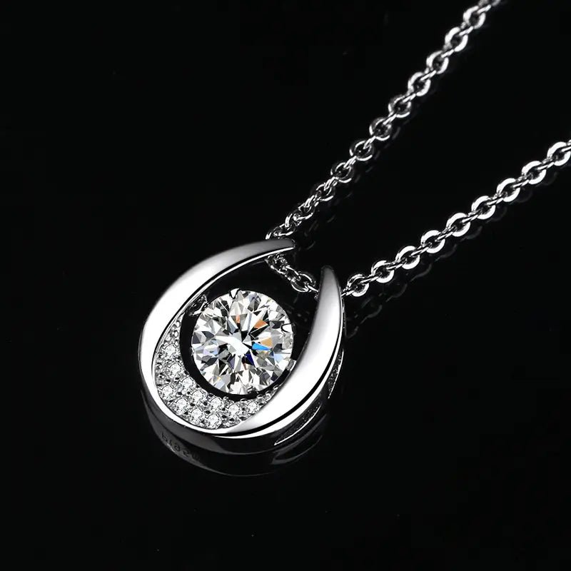Shop The Auralyn Moissanite Dancing Teardrop Necklace today at Chantal Vaulet. Discover stunning jewelry collections, crafted for style and brilliance.