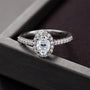 The Calivianne Moissanite Oval Halo Engagement Ring - Chantal Vaulet