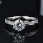 The Calyra Moissanite Twist Ring - Chantal Vaulet