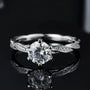 The Calyra Moissanite Twist Ring - Chantal Vaulet