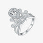 The Celestina Pear-Cut Moissanite Tiara Halo Ring - Chantal Vaulet