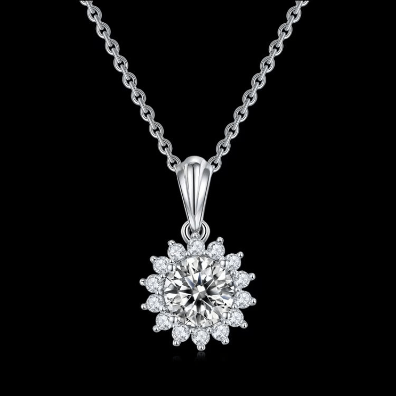 Shop The Clarielle Moissanite Sunburst Necklace today at Chantal Vaulet. Discover stunning jewelry collections, crafted for style and brilliance.