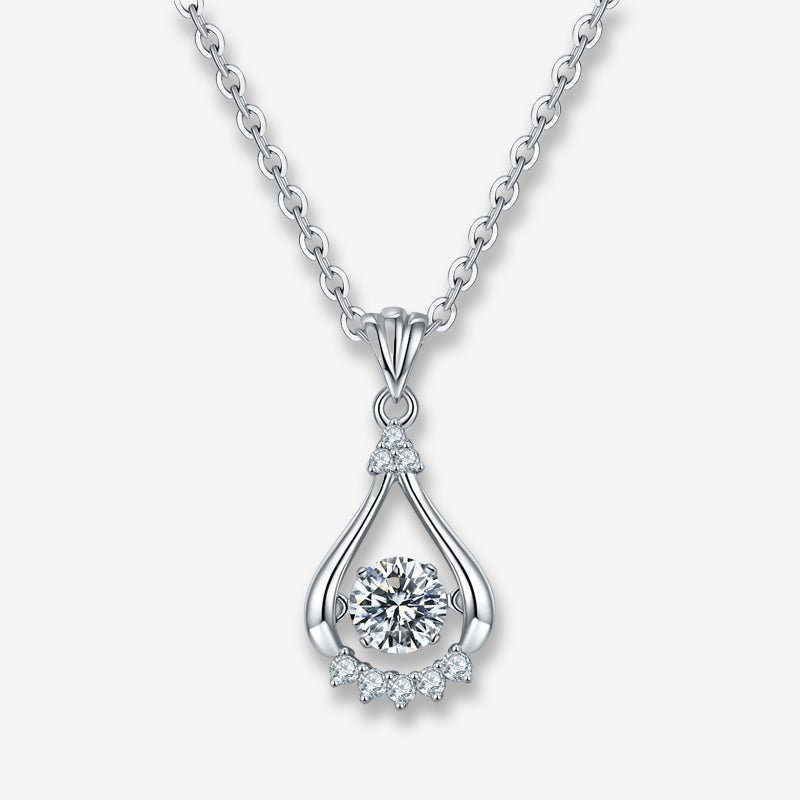 Shop The Valessia Moissanite Dancing Teardrop Necklace today at Chantal Vaulet. Discover stunning jewelry collections, crafted for style and brilliance.