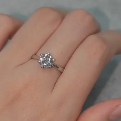 Moissanite solitaire engagement ring on finger, showcasing 1CT brilliance in a timeless six-prong setting 💍✨ #AmazingValue