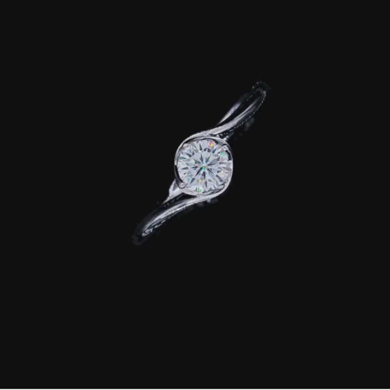 Shop The Zarela Round-Cut Moissanite Ring - 0.5CT or 1.0CT today at Chantal Vaulet. Discover stunning jewelry collections, crafted for style and brilliance.