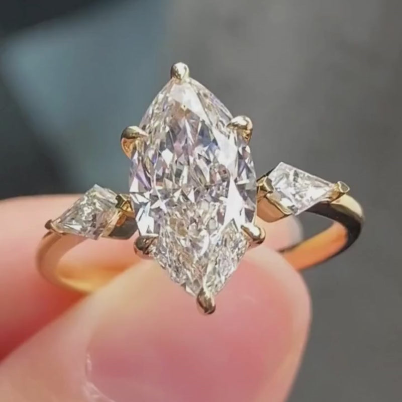 Discover our stunning 2CT Marquise Cut Engagement Ring, a blend of elegance & sparkle. Perfect for your love story!