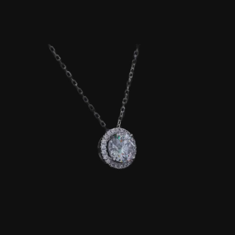 Shop The Lioranne Moissanite Halo Necklace today at Chantal Vaulet. Discover stunning jewelry collections, crafted for style and brilliance.