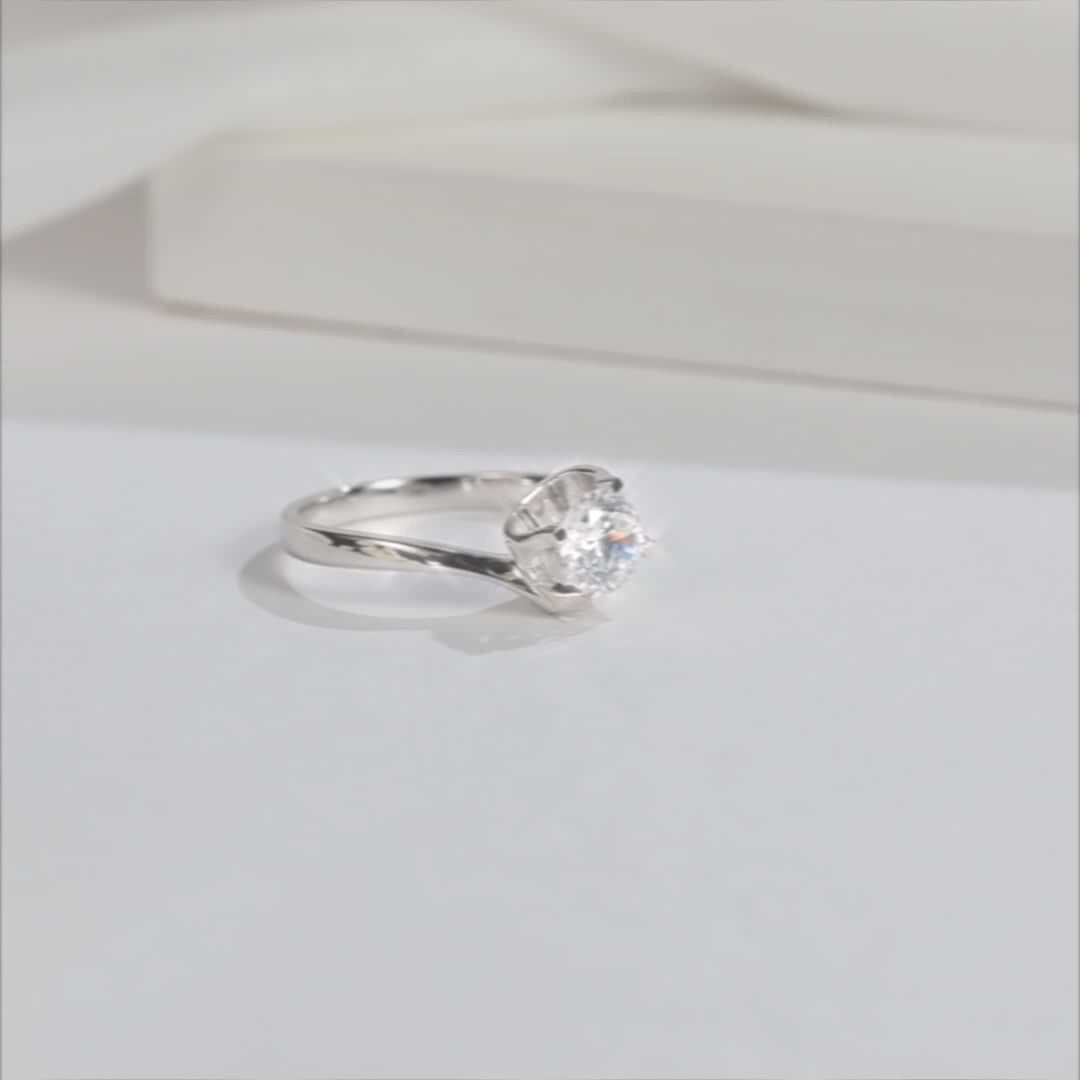 Shop The Virella 0.5CT Round-Cut Moissanite Ring today at Chantal Vaulet. Discover stunning jewelry collections, crafted for style and brilliance.