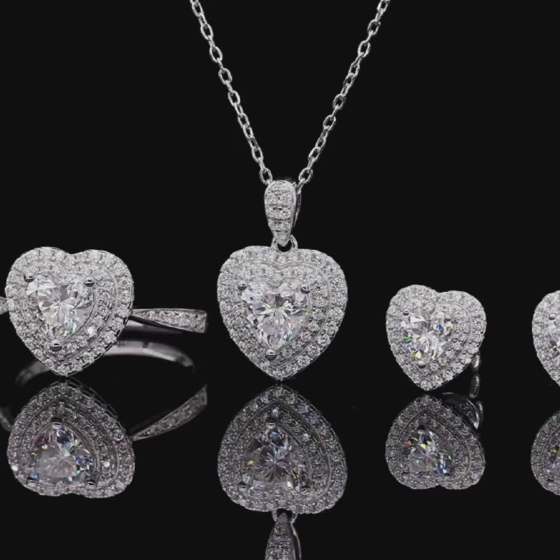 Shop The Velarisse Moissanite Heart Halo Earrings today at Chantal Vaulet. Discover stunning jewelry collections, crafted for style and brilliance.