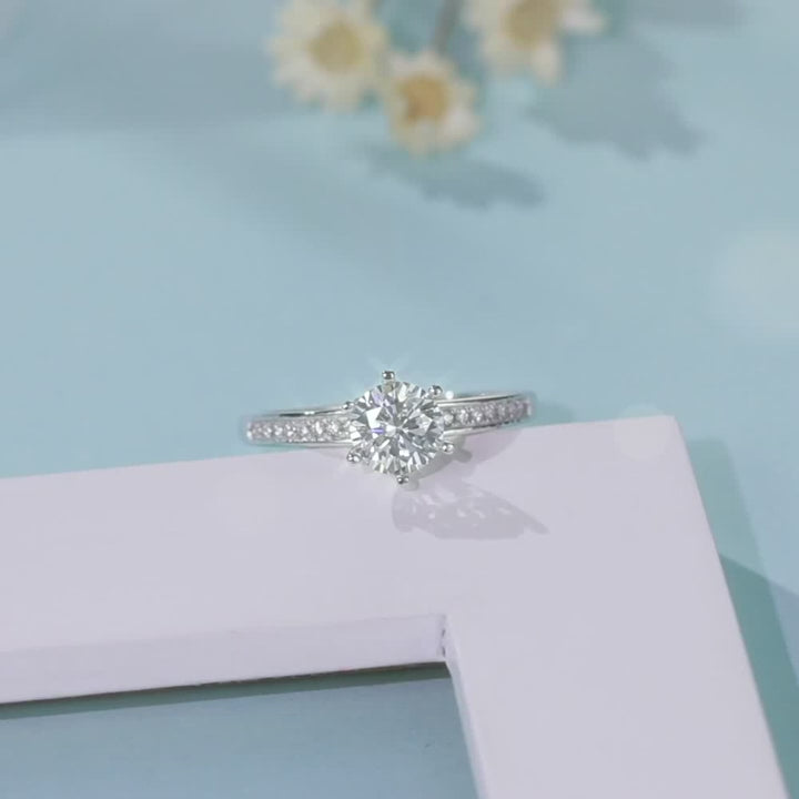 The Luvianne Moissanite Pavé Ring 💍✨ featuring a radiant 1.0CT Moissanite, perfect for engagements and weddings. Amazing value!