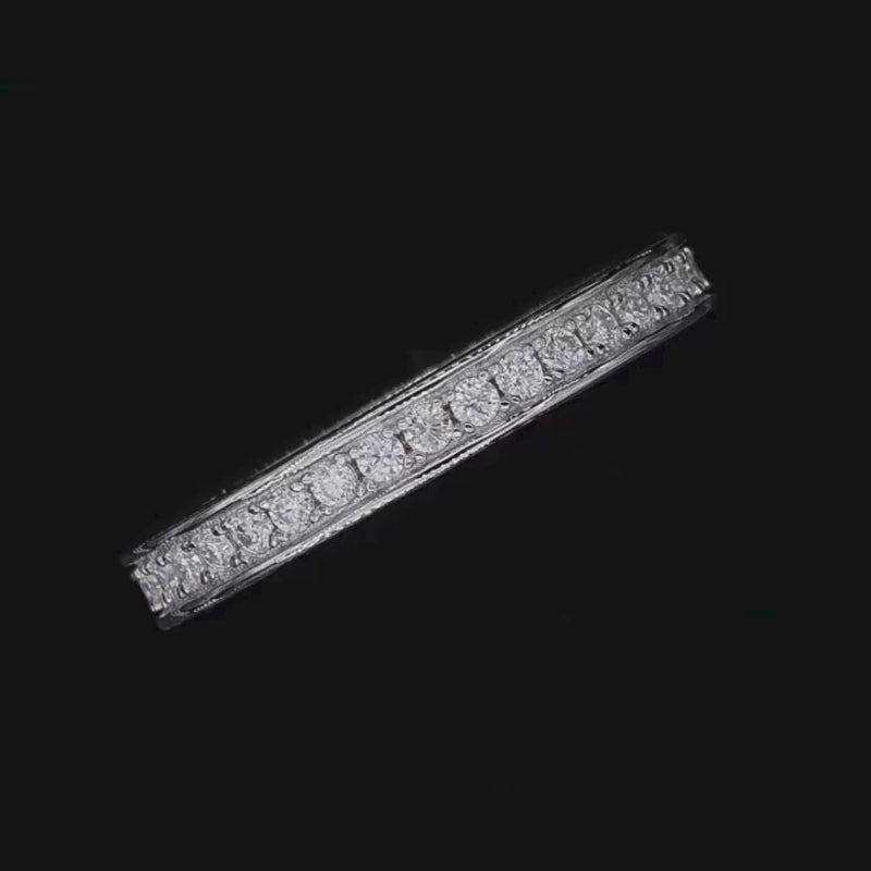 Shop The Milara Moissanite Channel-Set Eternity Band today at Chantal Vaulet. Discover stunning jewelry collections, crafted for style and brilliance.