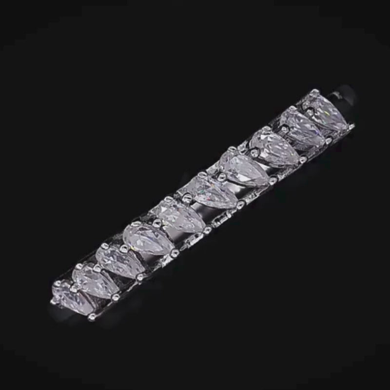 The Vespera Moissanite half-eternity band 💍✨ with marquise and round-cut stones, perfect for engagement or wedding. Amazing value!