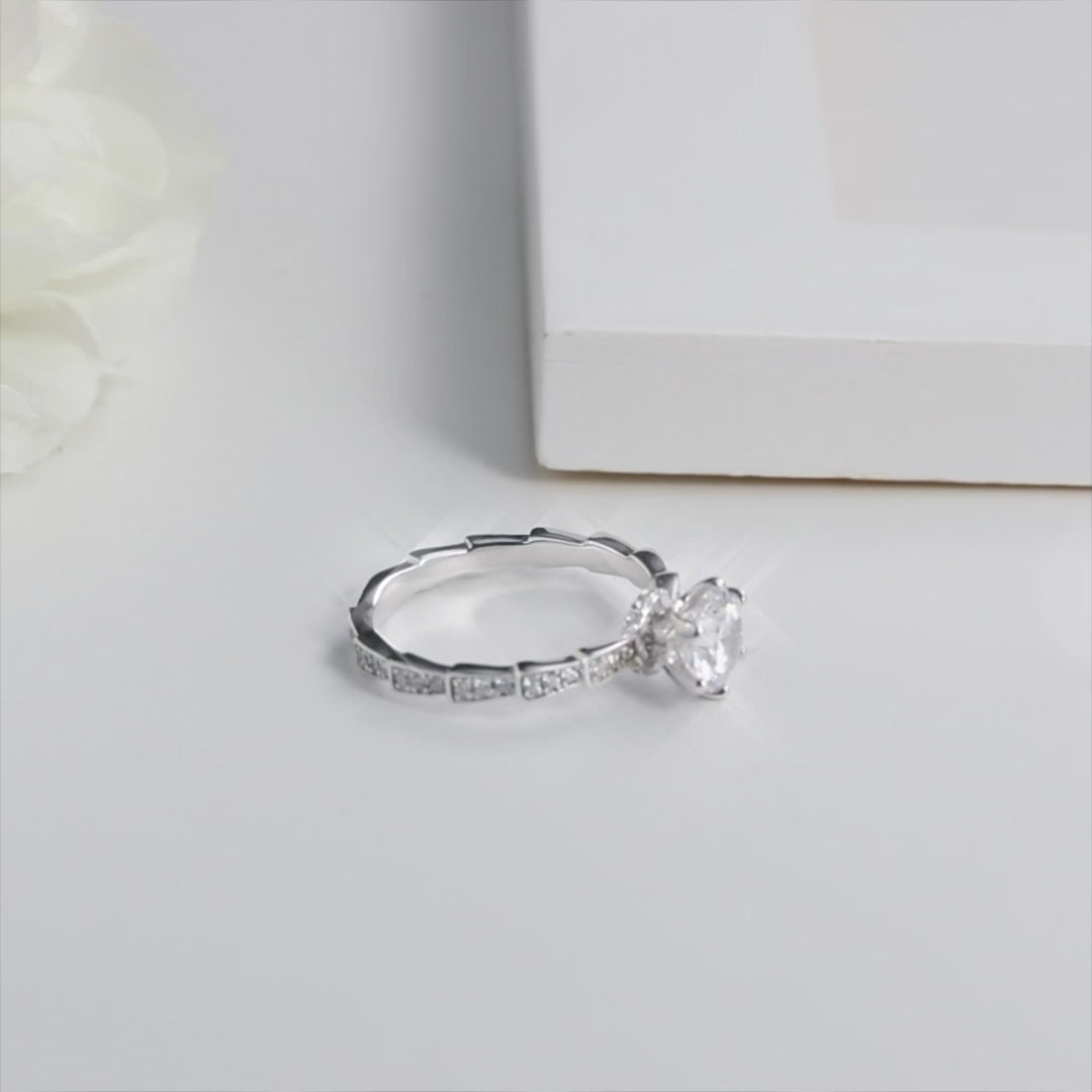 Shop Elysia Moissanite Engagement Ring 1.0ct today at Chantal Vaulet. Discover stunning jewelry collections, crafted for style and brilliance.
