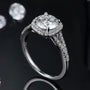 The Auretta – Moissanite Halo Split-Shank Ring 1.5CT RING by Chantal Vaulet