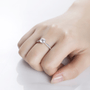 Elegant hand wearing the Avalyn Moissanite Pavé Ring for engagement or wedding 💍✨ | Amazing value and stunning design.