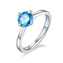 Avelora 1.0 CT Moissanite ring 💍 with round blue stone, elegantly set in polished sterling silver. Perfect for engagement! 💖