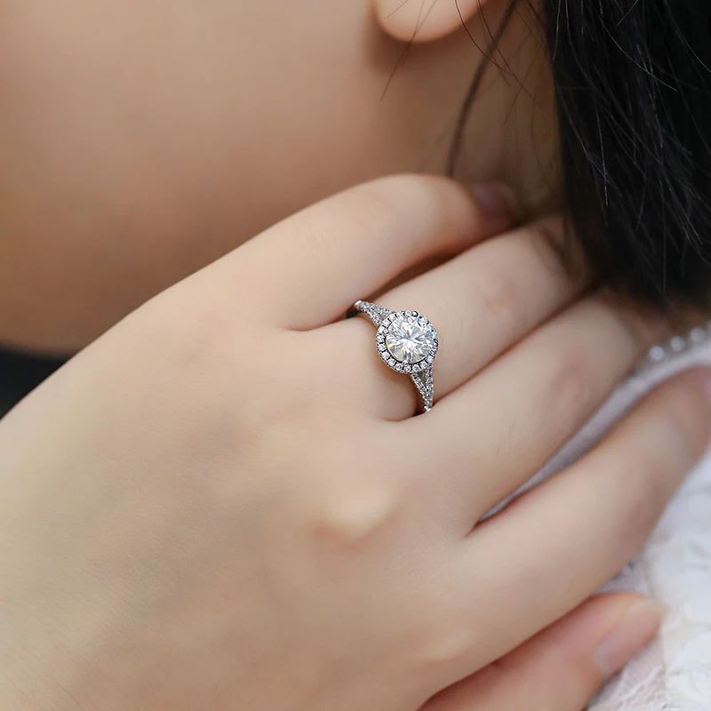 A close-up of The Belladonna Moissanite Pave Solitaire Ring on a hand, showcasing its sparkle and elegance ✨💍.