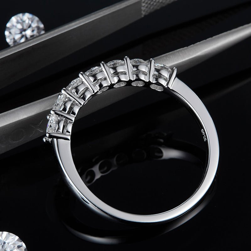 Moissanite seven-stone band ring showcasing brilliance and elegance, perfect for weddings and engagements 💍✨