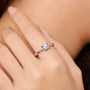 Elegant 0.5CT round-cut Moissanite ring on hand 💍✨, perfect for engagement or wedding, showcasing amazing value.