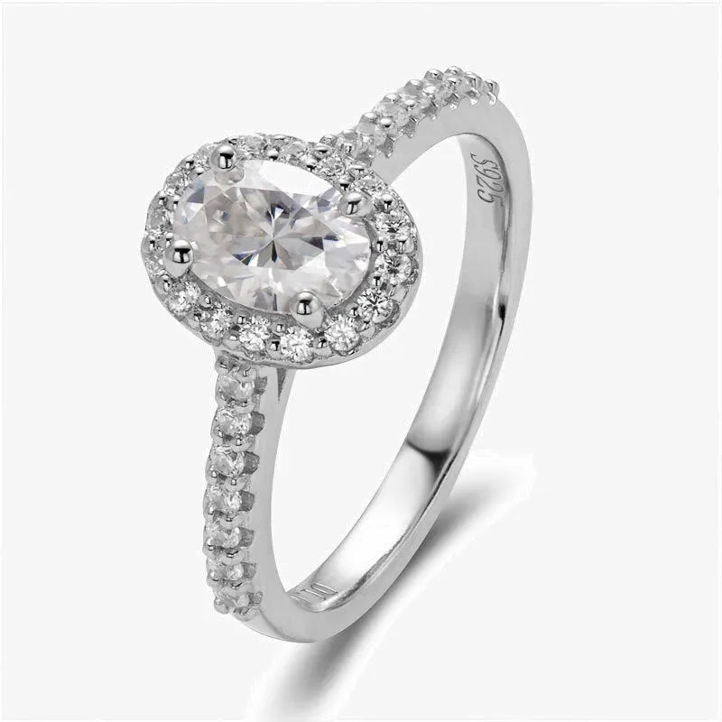 The Calivianne Moissanite Oval Halo Engagement Ring RING by Chantal Vaulet
