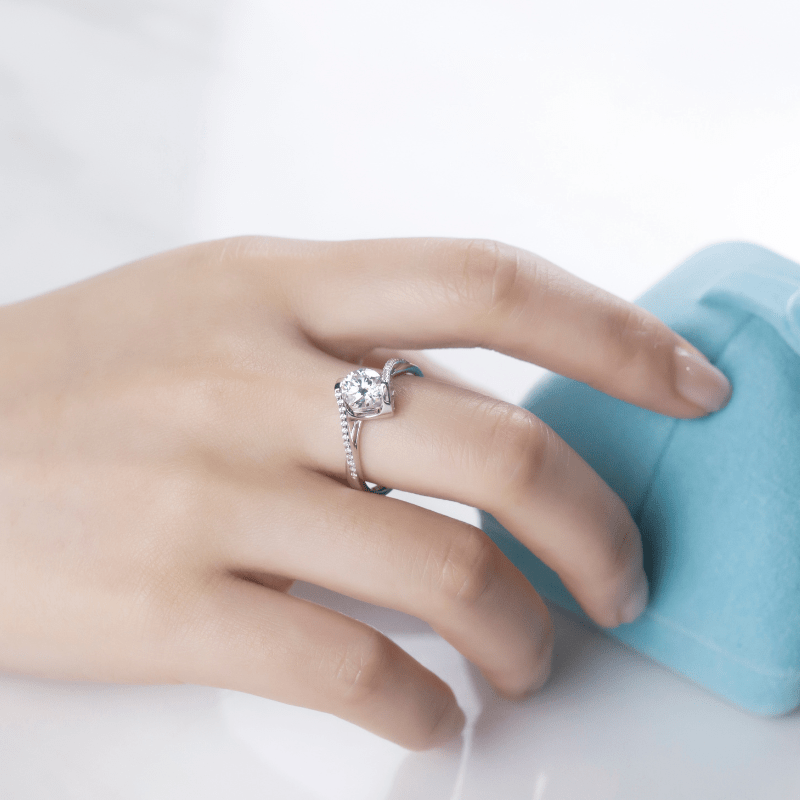Elegant hand showcasing The Callista ring with moissanite, symbolizing love and sophistication 💍✨