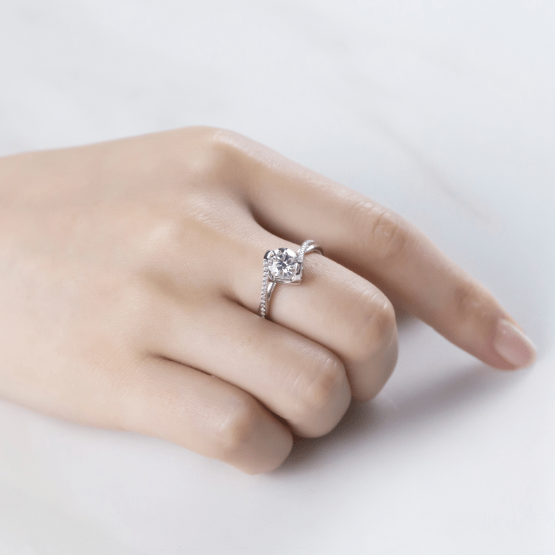 Elegant hand wearing The Callista ring with a 1.0CT moissanite, perfect for engagement and wedding 💍✨ #AmazingValue