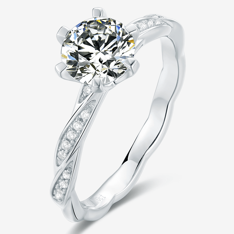 Elegant Calyra Moissanite Twist Ring 💍 with a stunning 1.0CT round cut centerpiece and sparkling pavé stones. Amazing value!