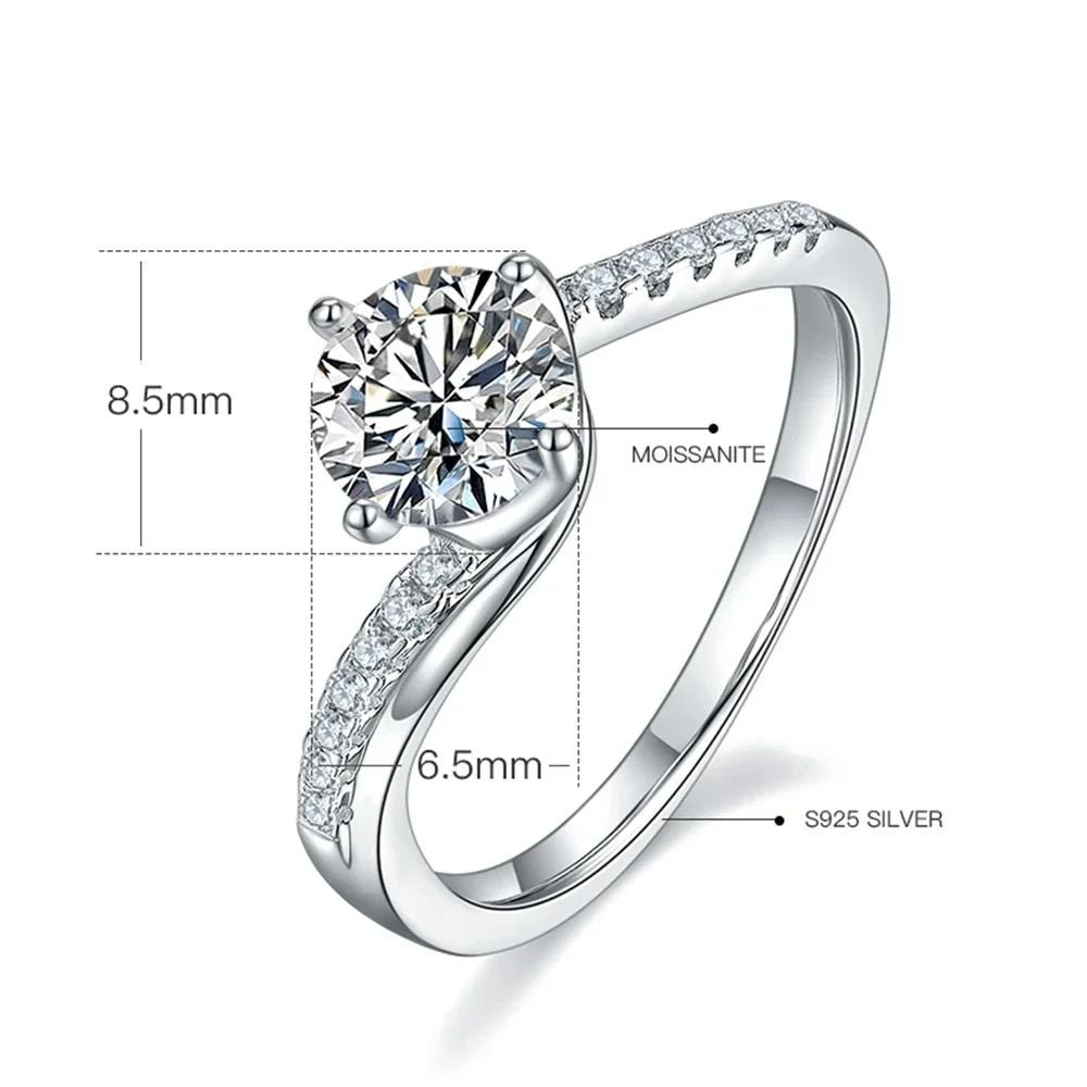 Elegant Elantria Moissanite Twist Ring 💍 with a radiant 1.0CT Moissanite and shimmering pavé stones. Perfect for engagement and weddings! 💖