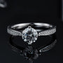 The Elara engagement ring featuring a stunning 1CT round moissanite and shimmering side stones ✨💍 Amazing value!