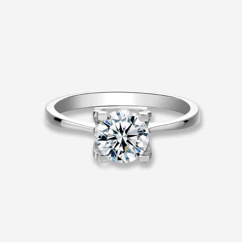 The Estelle Moissanite engagement ring 💍 featuring a 1CT round-cut stone. Amazing value & minimalist elegance! ✨