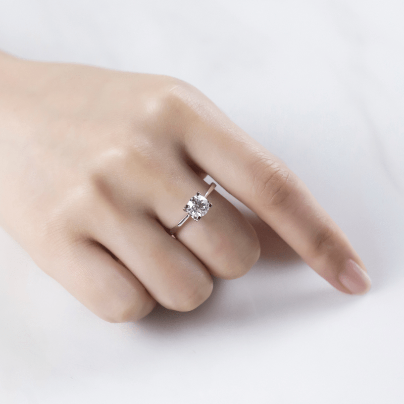 Elegant hand showcasing The Estelle 1CT moissanite engagement ring 💍✨. Perfect for proposals or weddings! Amazing value!