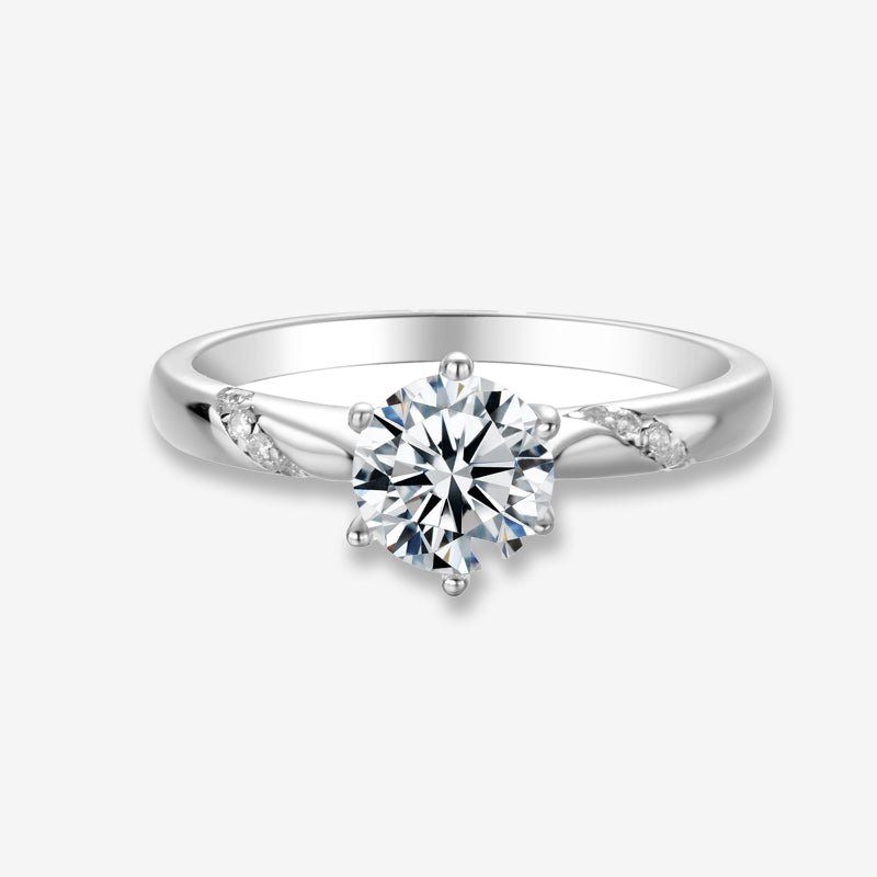 The Evanna Moissanite Solitaire Ring 💍✨ 1.0ct engagement/wedding ring, featuring a brilliant center stone and sparkling accents.