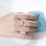 Elegant hand displaying the Isalyn 1CT Round-Cut Moissanite Ring 💍✨, perfect for engagement or wedding. Amazing value!