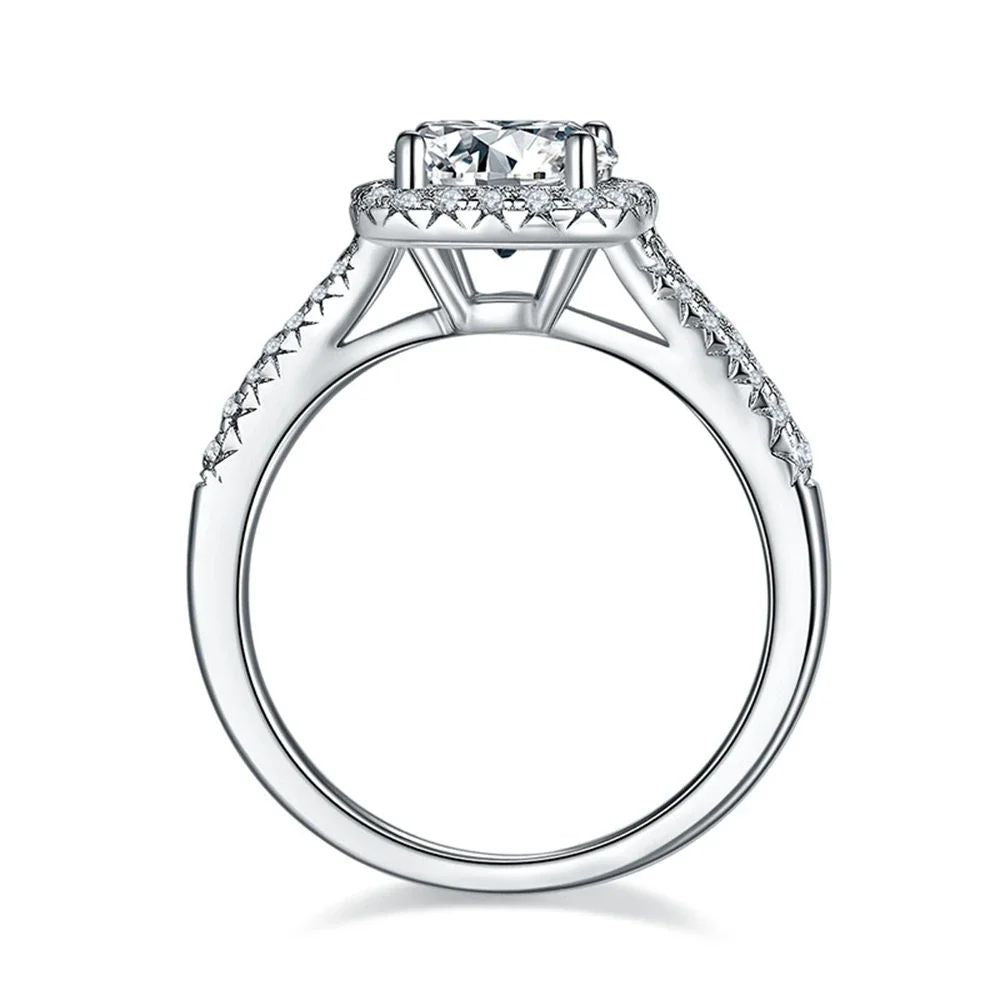 The Isolde Moissanite Halo Ring 3CT 💍✨ - Stunning engagement ring with dazzling moissanite centerpiece and split shank design.