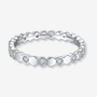 The Octavia Moissanite Hexagon Eternity Band 💍✨ features 15 round Moissanites in a stylish hexagonal design, perfect for weddings!