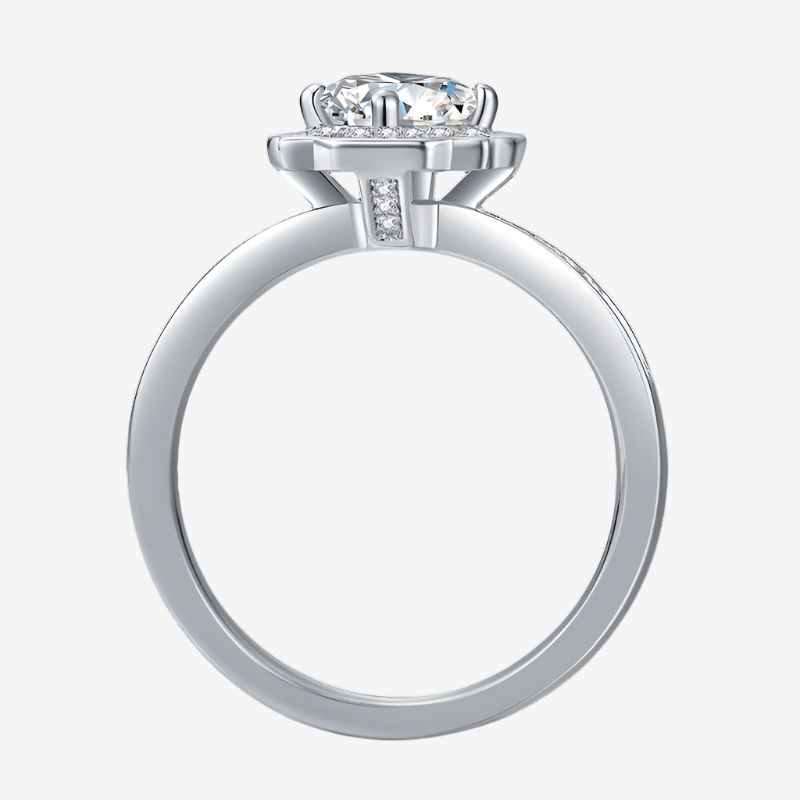 The Orliana Moissanite Halo Ring 💍 features a stunning round-cut stone and elegant pavé accents. Perfect for engagements!✨