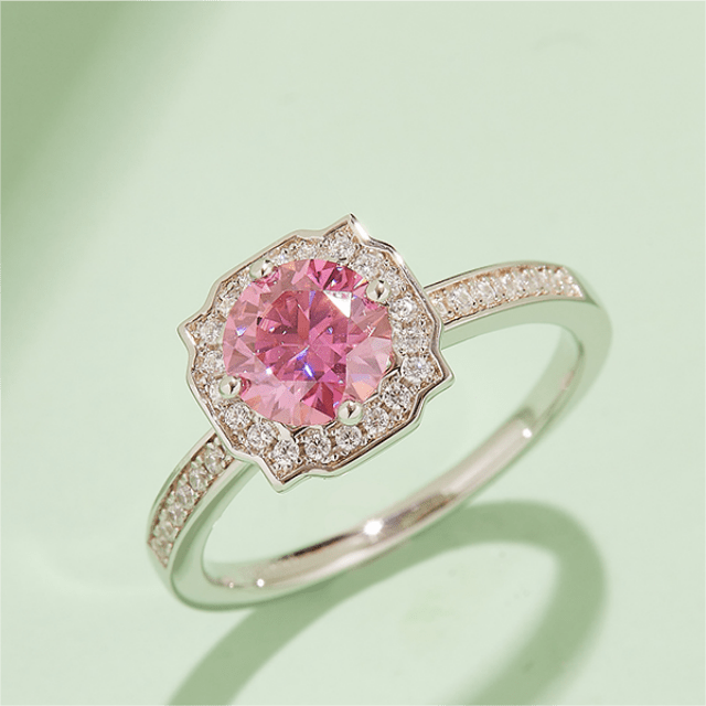 Elegant pink gemstone ring with diamond halo, perfect for weddings or engagements 💍✨ #engagement #wedding #jewelry