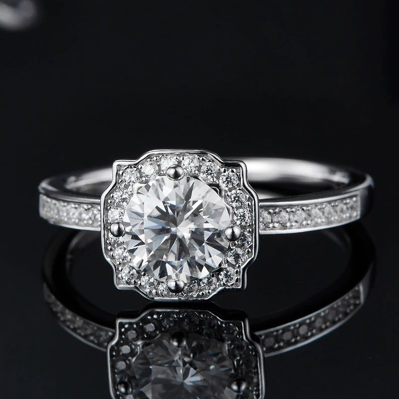 Stunning Orliana Moissanite Halo Ring 💍✨ featuring a 1.0CT round Moissanite and a unique scalloped halo. Perfect for engagement or wedding!