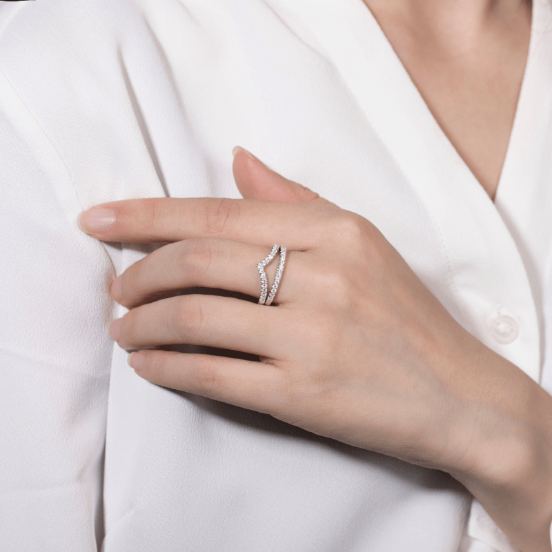 Stylish hand wearing the Selina Moissanite Chevron Band 💍✨ Perfect for weddings or stacking! Amazing value!