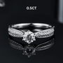Stunning 0.5CT round-cut Moissanite ring with zirconia side stones, perfect for engagement or wedding 💍✨ #AmazingValue