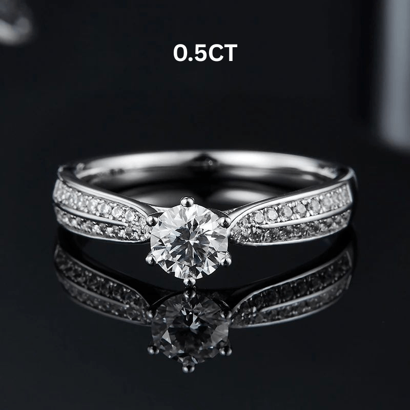 Stunning 0.5CT round-cut Moissanite ring with zirconia side stones, perfect for engagement or wedding 💍✨ #AmazingValue