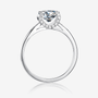 Moissanite engagement ring with round center stone and sparkling accent stones. Perfect for weddings! 💍✨ #AmazingValue