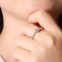 Elegant hand wearing The Solaya 0.5CT Moissanite Ring 💍✨, perfect for engagements or weddings! #Moissanite #Luxury