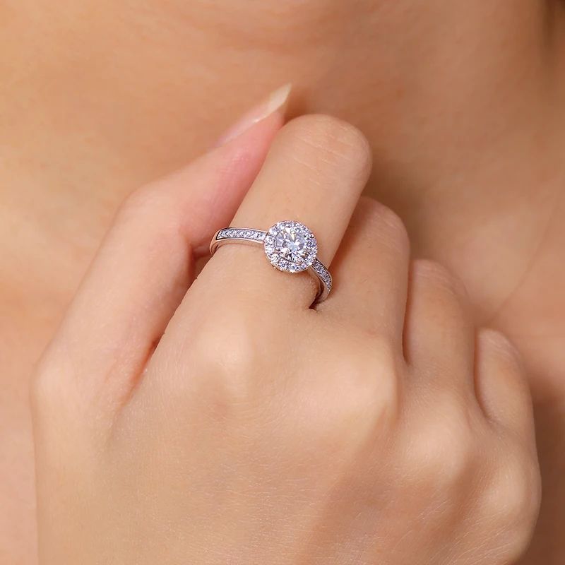 Stunning Solenne Moissanite Halo Ring 💍 with 0.5CT center stone and sparkling pavé band, perfect for engagements or weddings! ✨